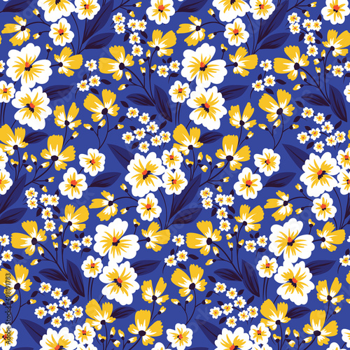 Seamless pattern, rustic floral print with decorative white and yellow flowers, leaves, twigs on a blue field. Botanical background with small plants. Vector illustration.