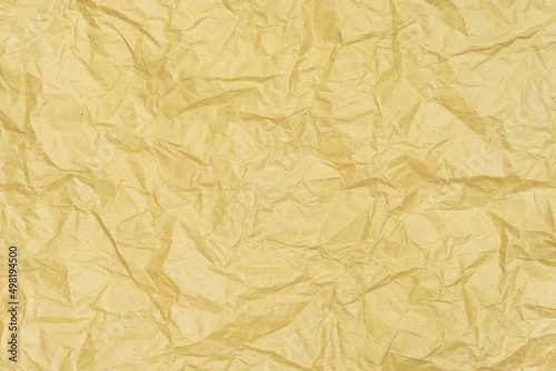 texture background of crumpled golden craft paper