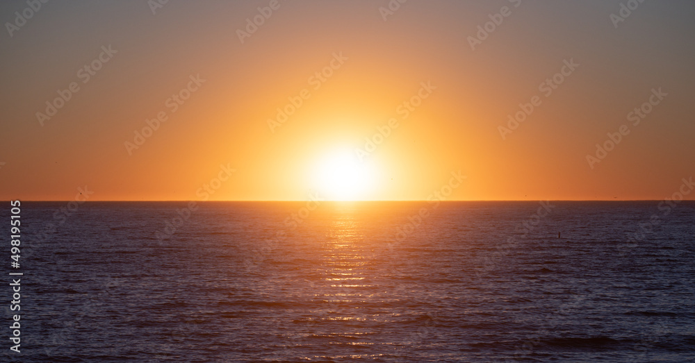 Panoramic sea ocean sunrise. Sunset at sea landscape. Dramatic sunset sky with clouds. Dramatic sunset over the sea.