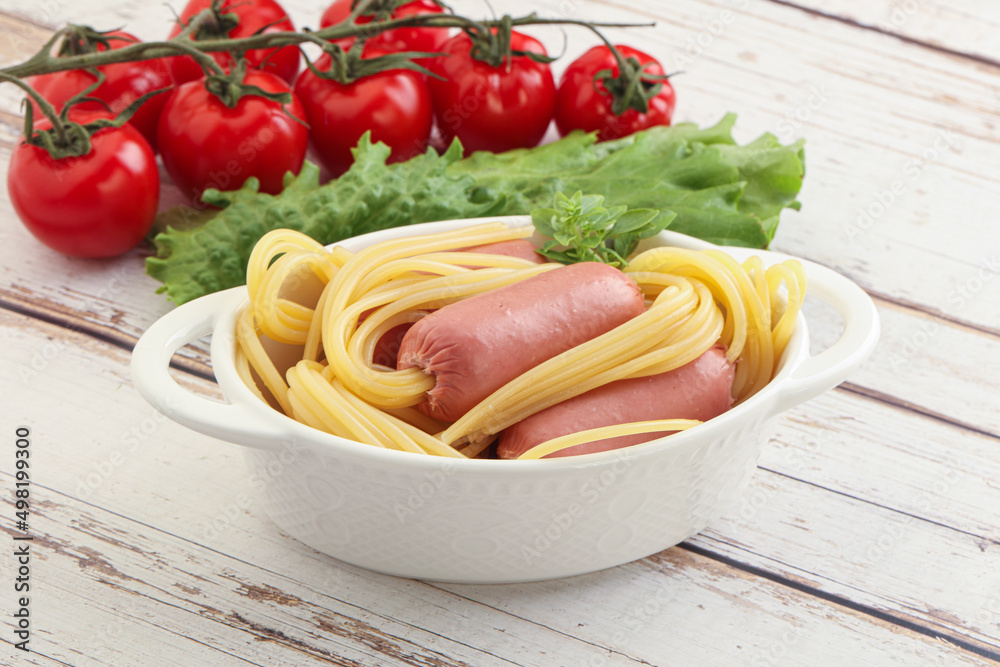 Mini sausages with pasta spaghetti Mini sausages with pasta spaghetti