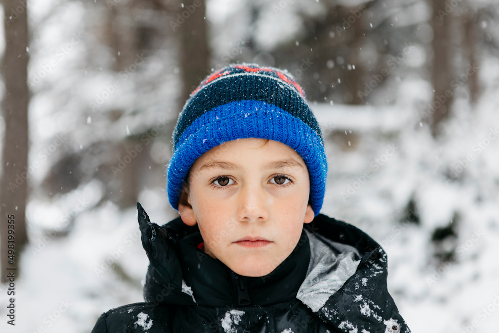 Boy wearing knit hat in winter
