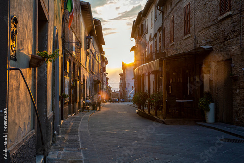 Italy, Province of Siena, Radicondoli, Old town alley at sunset photo