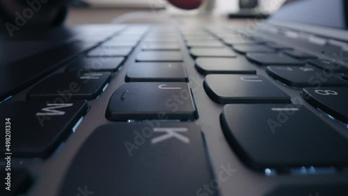 Close-up Moving Macro Shot: close up hands typing on keyboard programmer coding software gamer using keyboard photo