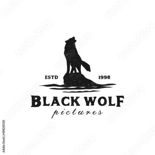 Standing Black Wolf Fox Dog Coyote Jackal on the Rock Rustic Vintage Silhouette Retro Hipster Logo Design