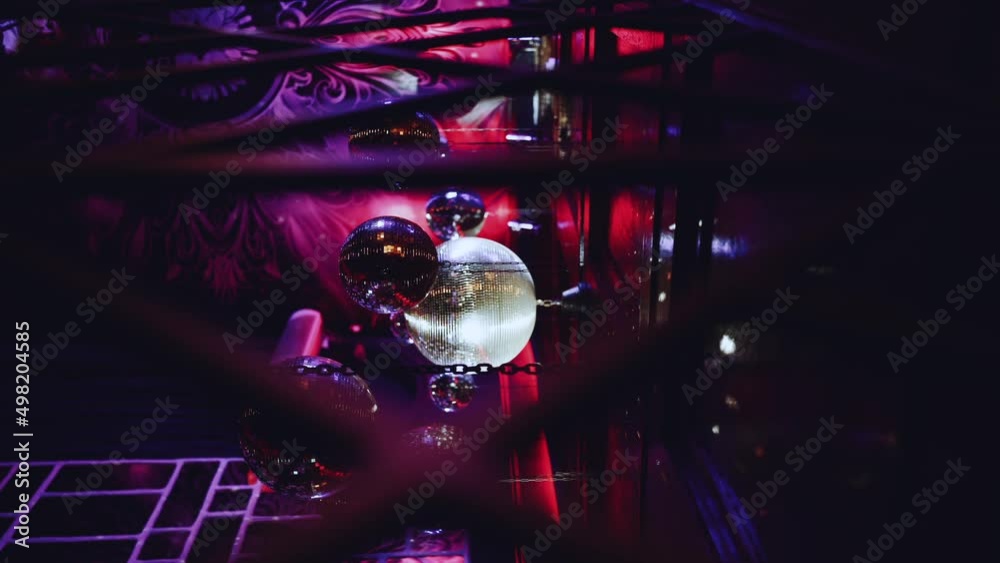 Disco balls in a nightclub, vertical video Disco balls in a nightclub, vertical video