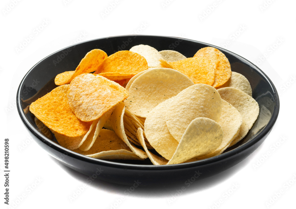 Black bowl of potato chips mix isolated on white background Black bowl of potato chips mix isolated on white background