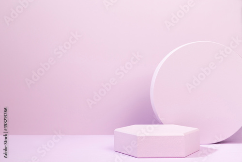 probes in geometric shapes on pink background, stand for product