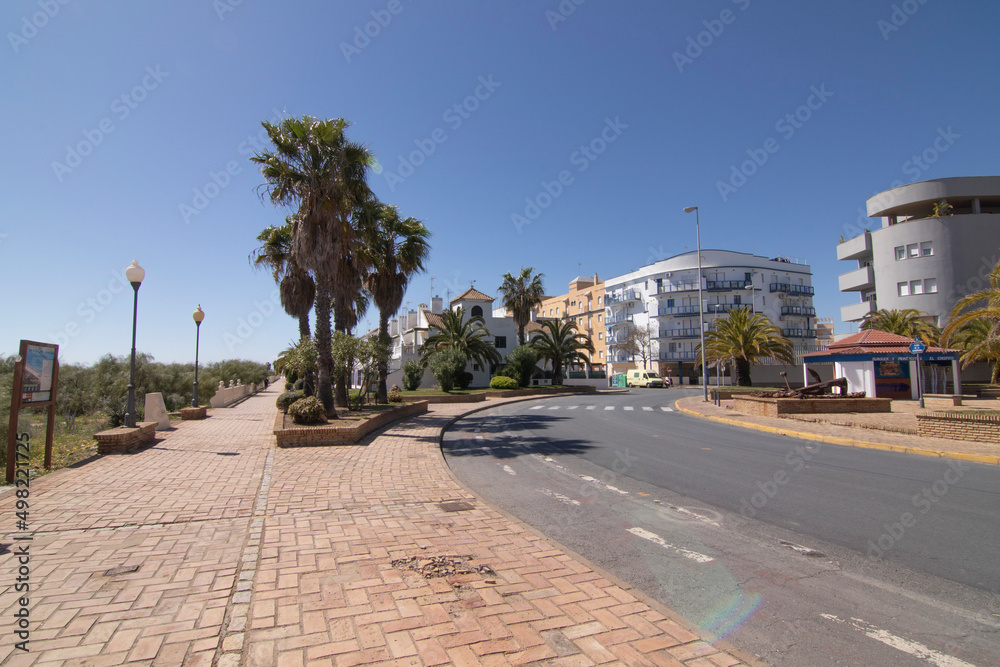 Promenade on the beach of Isla Cristina, Huelva, Spain.