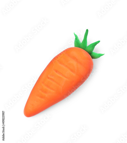 Orange carrot made from play dough on white background