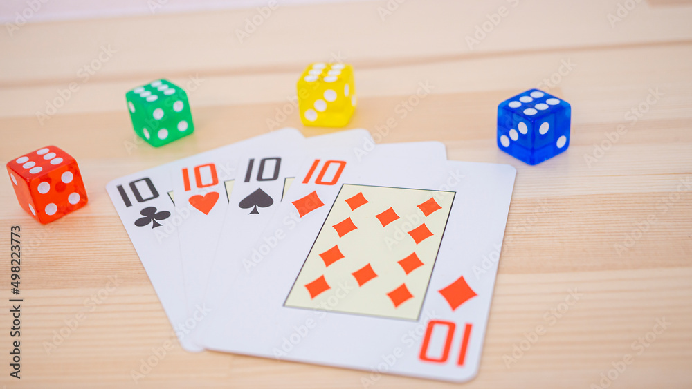 Playing cards and colorful dice_12