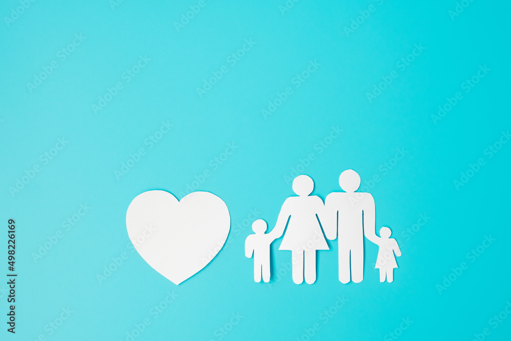 Happy Family day. paper shape cutout with Father, Mother, Children and heart. international day of families, Warm home, love, Foster, Insurance, Charity and Donation concepts. Happy Family day. paper shape cutout with Father, Mother, Children and heart. international day of families, Warm home, love, Foster, Insurance, Charity and Donation concepts.