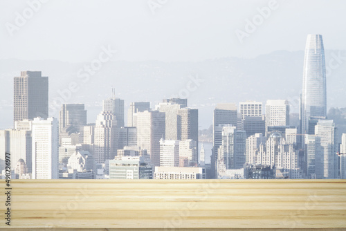 Empty table top made of wooden dies with San Francisco city view at daytime on background, template © Pixels Hunter