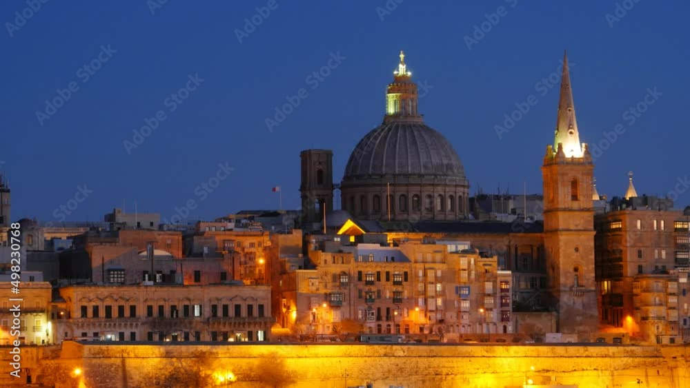 Darkness falls in time lapse, Valletta, Malta