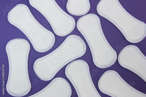 women's sanitary pads on a purple background very peri