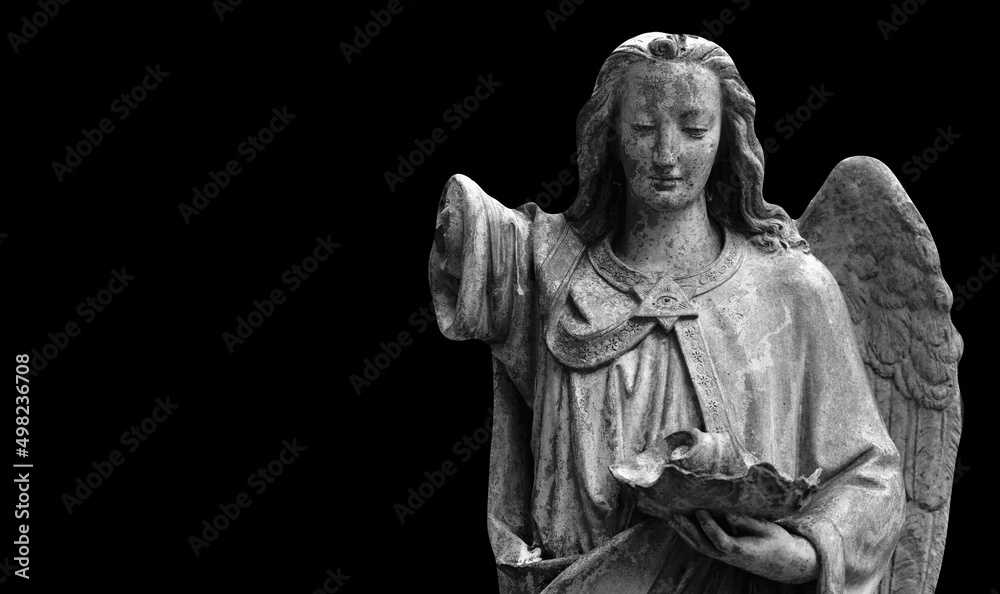 Death. Angel as symbol of pain, fear and end of life. Antique stone statue isolated on black background. Copy space.