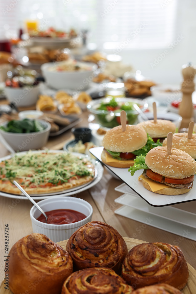 Brunch table setting with different delicious food indoors Brunch table setting with different delicious food indoors