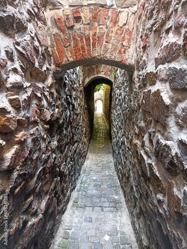 Narrowest alley in The Czech Republic - Executioner or Hangman small street. Hangman small street is a unique architectural and urban element of the city fortifications in Kadan photo