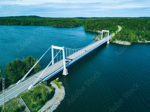Aerial view of white cable-stayed bridge in Finland. Beautiful summer landscape.