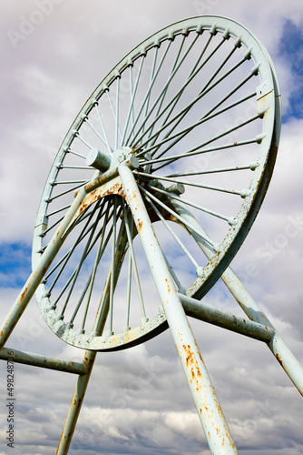 Newcastle-under-Lyme, Staffordshire,Apedale pit wheel memorial and coal tub located in Apedale community park, formerly opencast mining photo