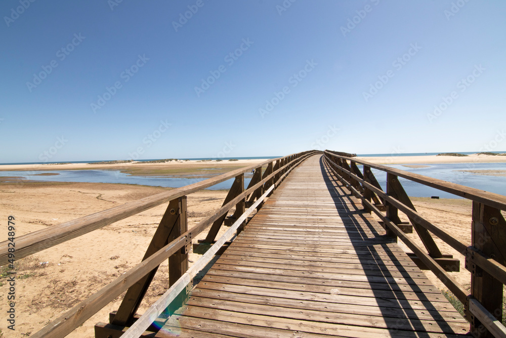 A wooden walkway, on the beach of Isla Cristina, Spain. Widely used by vacationers on vacation.