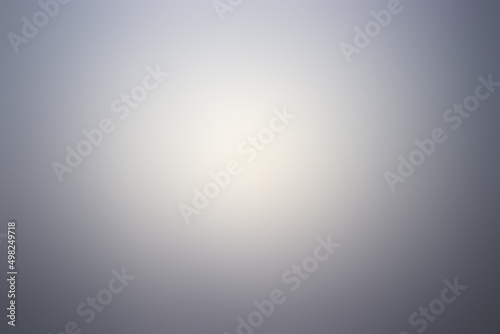 Abstract black and gray gradient soft light background of studio room for art design.