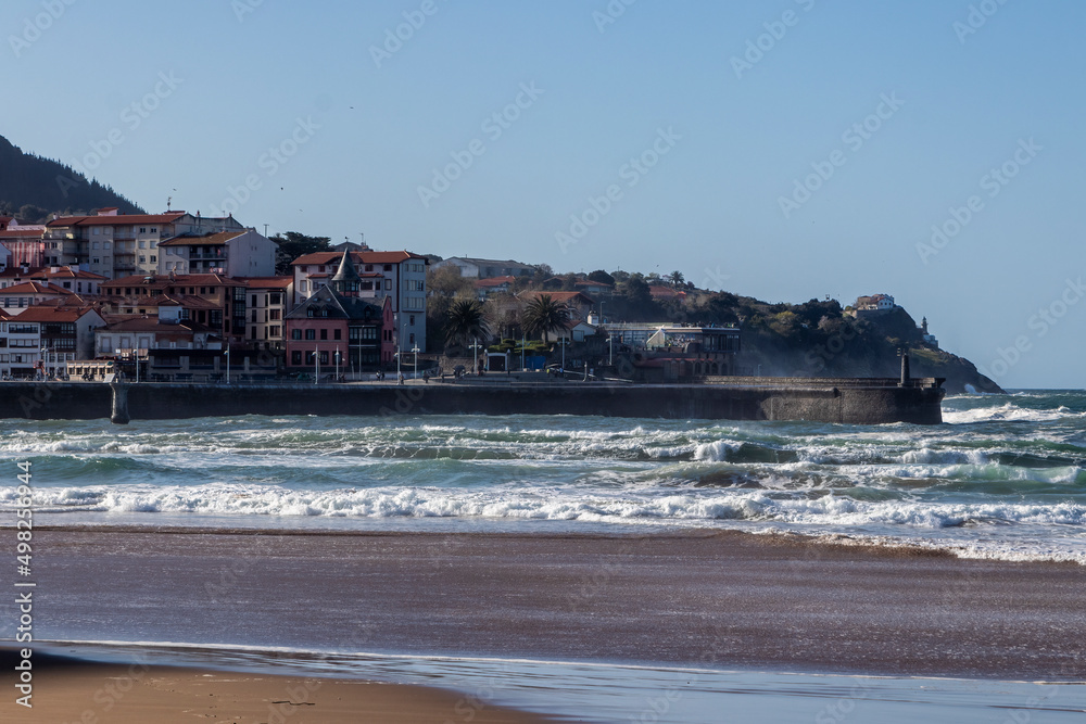 beach and port of lekeitio a day with waves