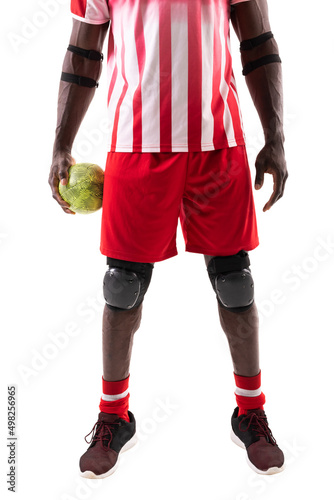 Low section of african american handball player wearing protective guards holding ball