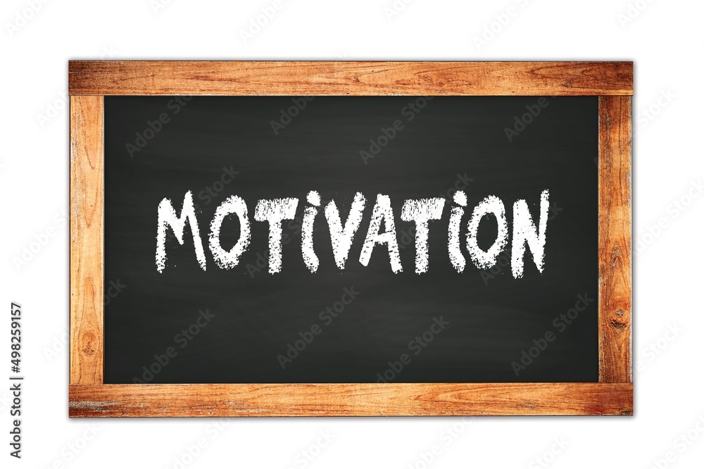 MOTIVATION text written on wooden frame school blackboard. MOTIVATION text written on wooden frame school blackboard.