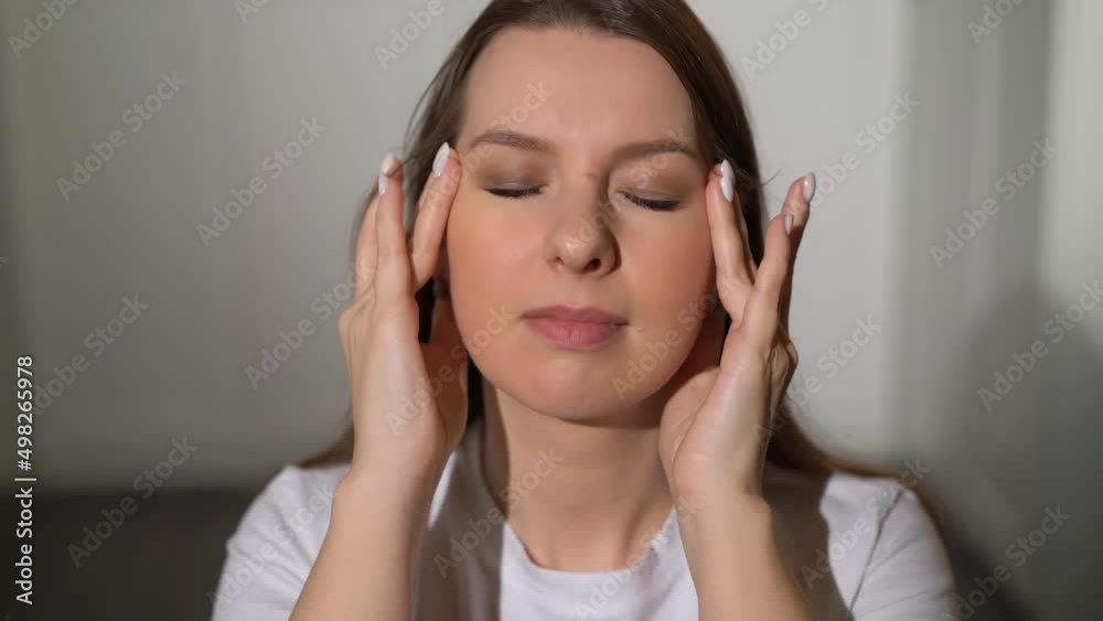 Young woman holding head. Female with headache. Person feel pain, touch face. Migraine or stressed worried girl. Young woman holding head. Female with headache. Person feel pain, touch face. Migraine or stressed worried girl.