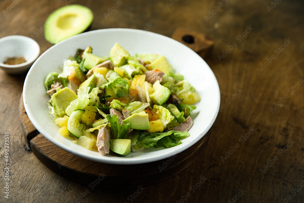 Healthy salad with duck, pineapple and avocado Healthy salad with duck, pineapple and avocado