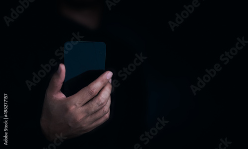 Wallpaper Mural Future transparent glass phone Technology. Mock-up blank screen futuristic super slim transparent smartphone in business person hand on dark with copy space. Future technology communication equipment. Torontodigital.ca