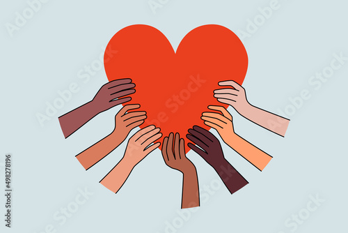 Diverse people hands hold huge heart show care and love to society. Multiracial persons involved in charity or volunteer work help those in need. Global support and aid. Vector illustration. 