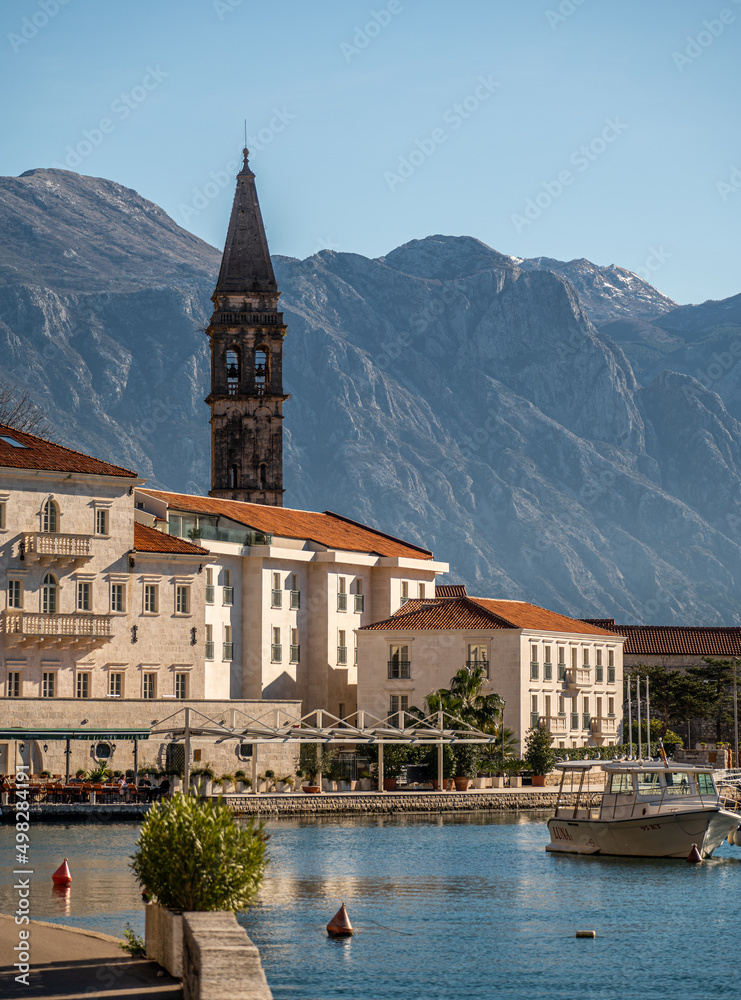 Historic city of Perast at Bay of Kotor in summer, Montenegro. Scenic panorama view of the historic town of Perast located at world-famous Bay of Kotor on beautiful sunny day with blue sky in summer