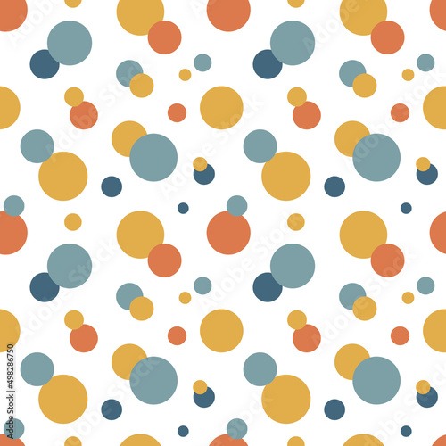 Colorful circles seamless pattern isolated on white background. Blue, yellow and terracotta minimalist shapes vector illustration.