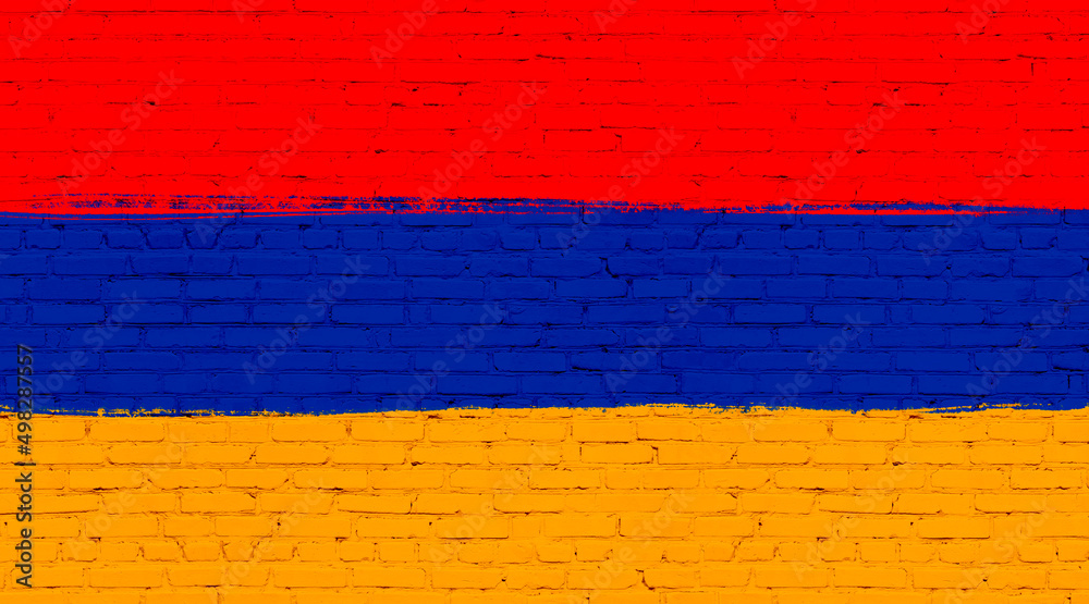 Armenia flag painted on brick wall. National country flag background photo