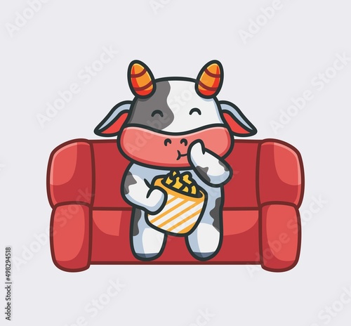 cute cow watching movie eating popcorn. isolated cartoon animal nature illustration. Flat Style suitable for Sticker Icon Design Premium Logo vector. Mascot Character