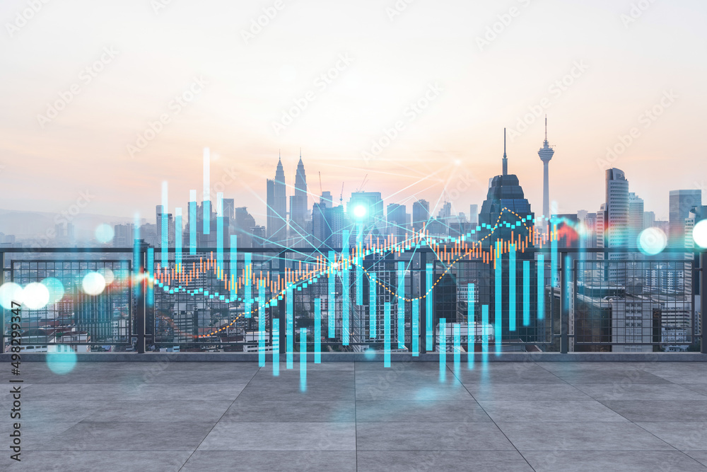 Obraz premium Rooftop with concrete terrace, Kuala Lumpur sunset skyline. Forecasting and business modeling of financial markets hologram digital charts. City downtown. Double exposure.