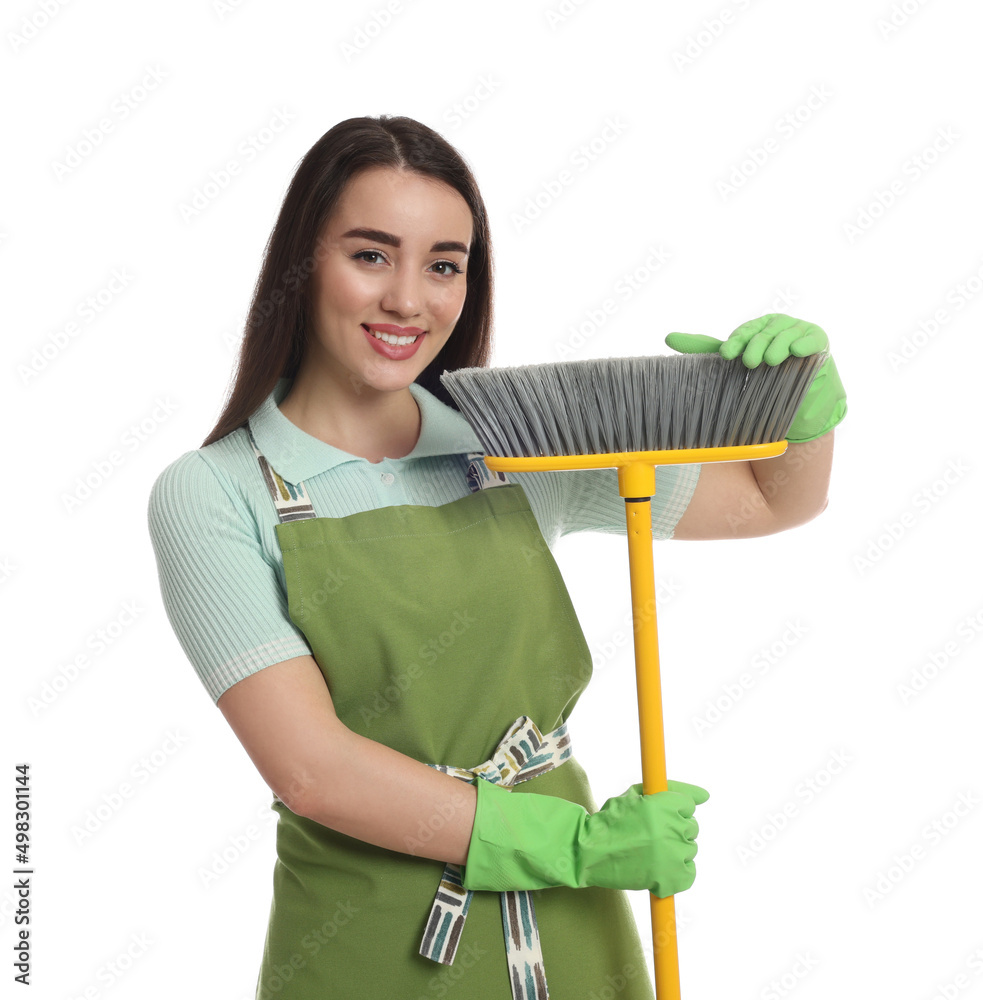 Beautiful young woman with broom on white background