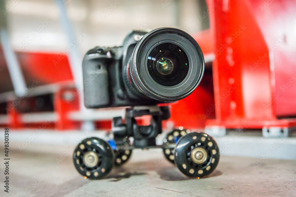 DSLR camera on mini table desktop rail wheel system DSLR camera on mini table desktop rail wheel system