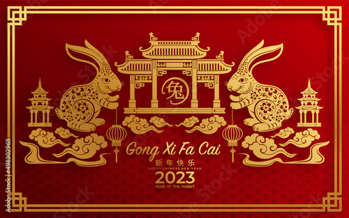 Happy chinese new year 2023 year of the rabbit zodiac sign with flower,lantern,asian elements gold paper cut style on color Background. (Translation : Happy new year)