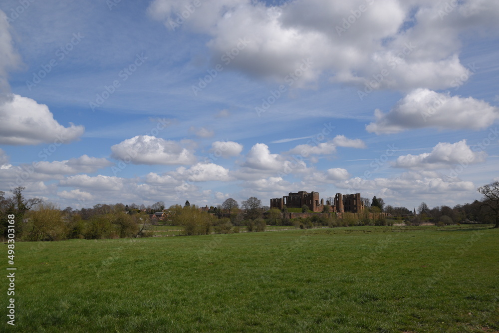 a view of Kenilworth castle from the fields 