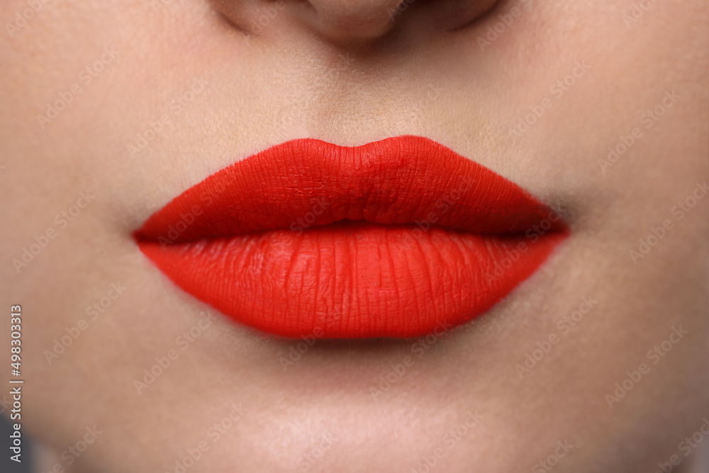 Young woman with beautiful red lips, closeup Young woman with beautiful red lips, closeup