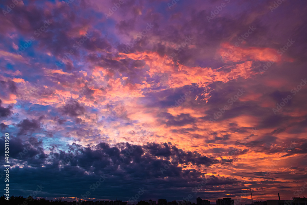Fototapeta premium Purple sunset on sky. Natural background, dramatic sky.