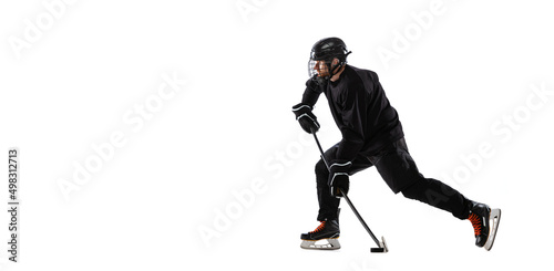 Professional male sportsman, hockey player training isolated over white studio background. Flyer