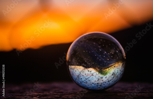 clear glass globe at sunset