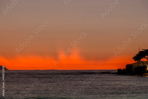 sunrise at Copacabana beach in Rio de Janeiro.
