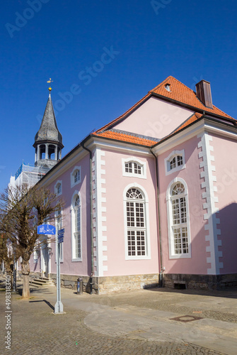 Historic pink St. Nicholas church in the center of Gifhorn, Germany