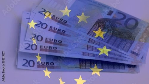 Animation of flag of european union over euro currency banknotes photo