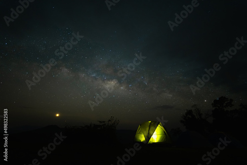 Fototapeta Naklejka Na Ścianę i Meble -  milky way with meteor star and hiking tent in summer time