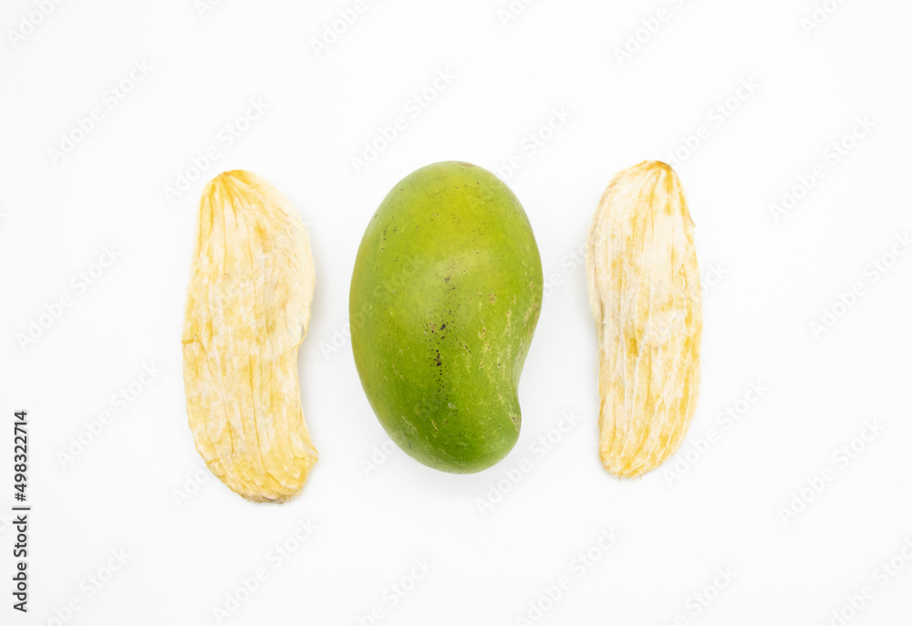 mango with two mango seeds on white background